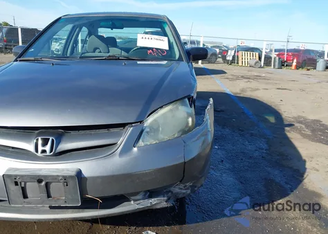 2004 Honda Civic Lx z USA, uszkodzony, nr VIN 2HGES16574H519882